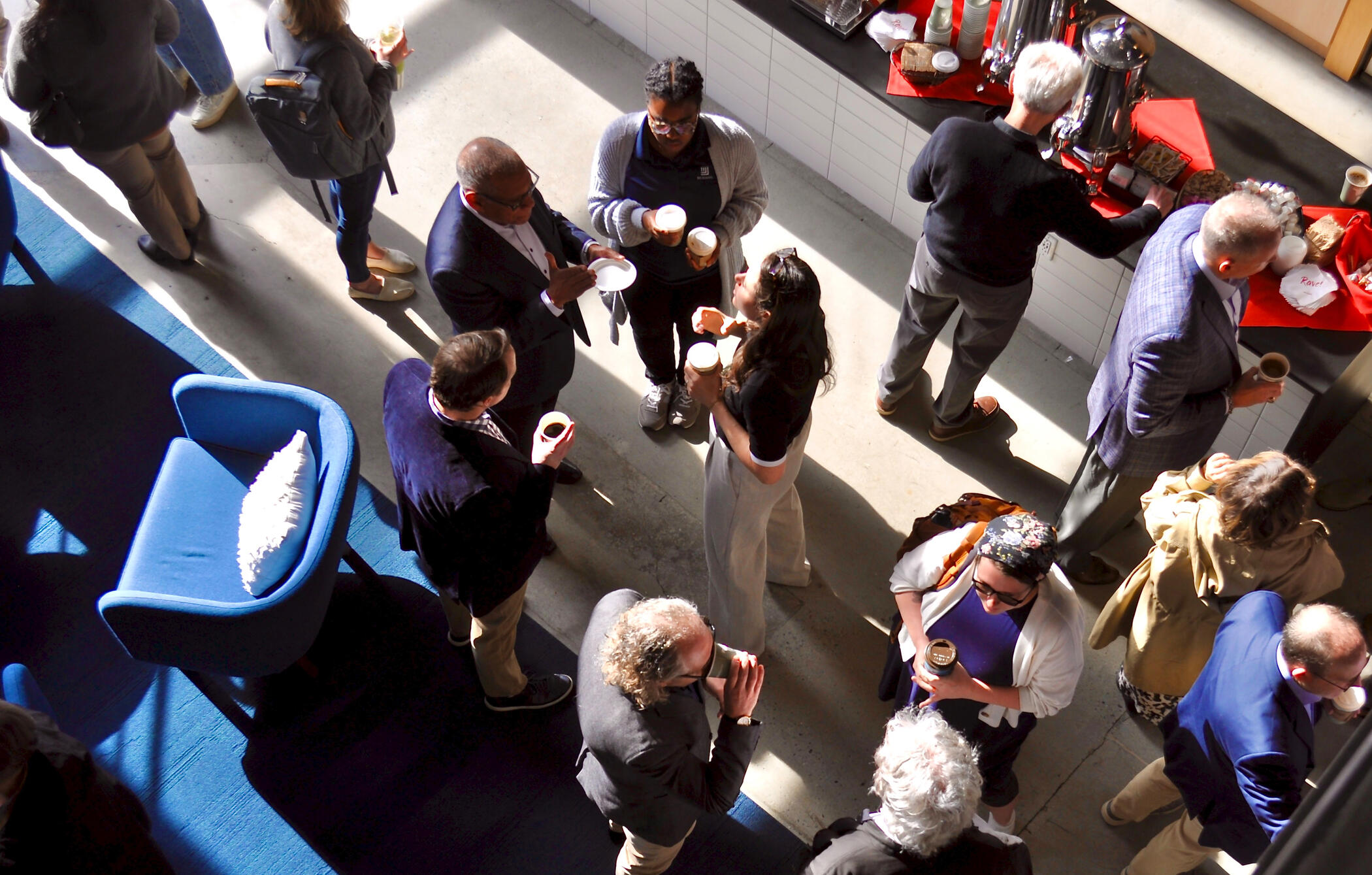 Coffee at Centennial Group of people holding coffee and chatting