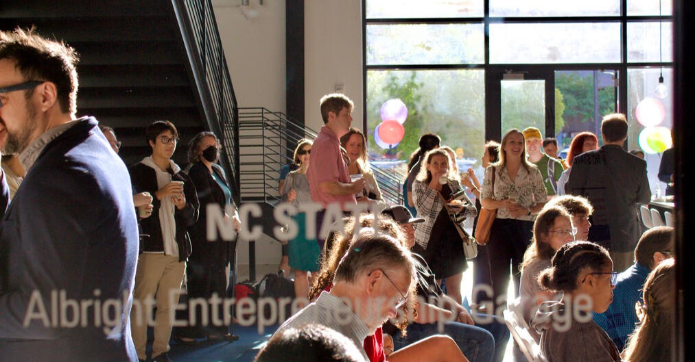 Gathering A group of people standing at an event